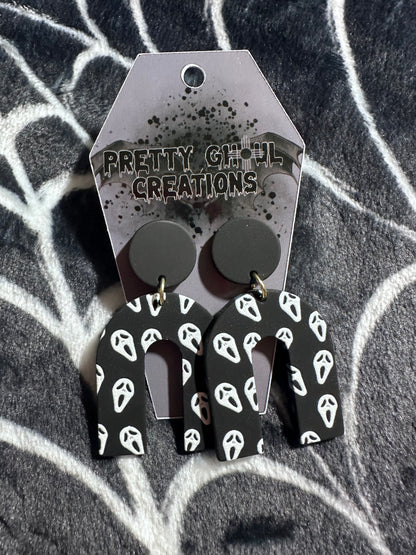 Scream dangle earrings